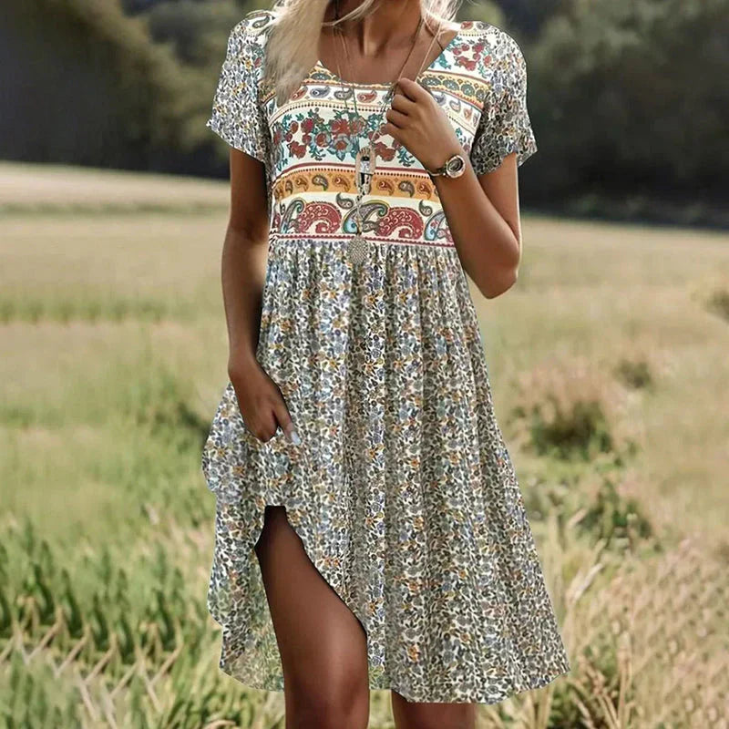 Lina® | Polka dot midi dress with short sleeves and a round neckline