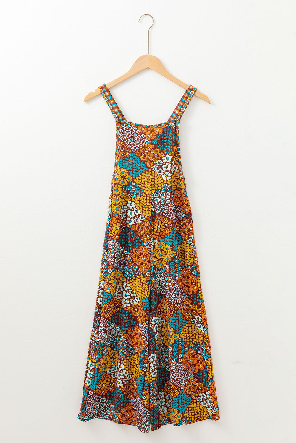 Addison® | Wide leg jumpsuit with cross straps and floral print