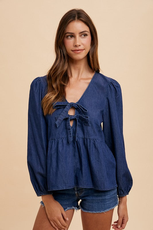 Lyra® | Long sleeve denim top with tie front peplum