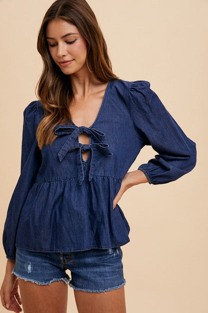 Lyra® | Long sleeve denim top with tie front peplum