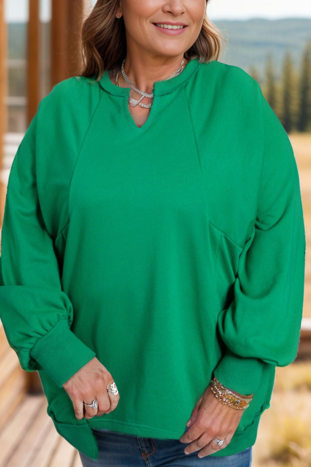 Yvonne® | Plus size long sleeve sweatshirt with cutout hem and notched hem