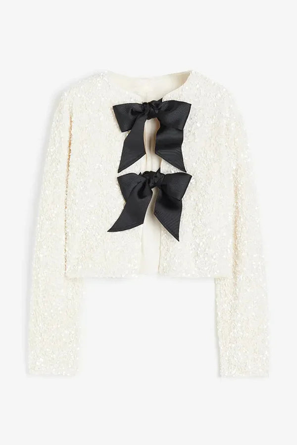 Leslie® | Two ways to celebrate a jacket with a bow and sequins at the front